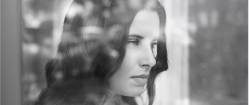 Woman looking out of the window